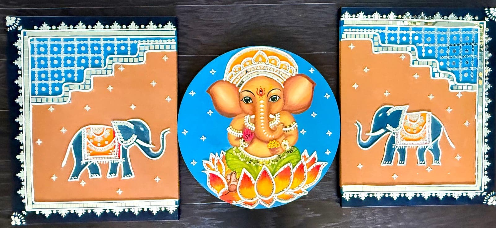 Ganesha and elephants — traditional Indian mural triptych